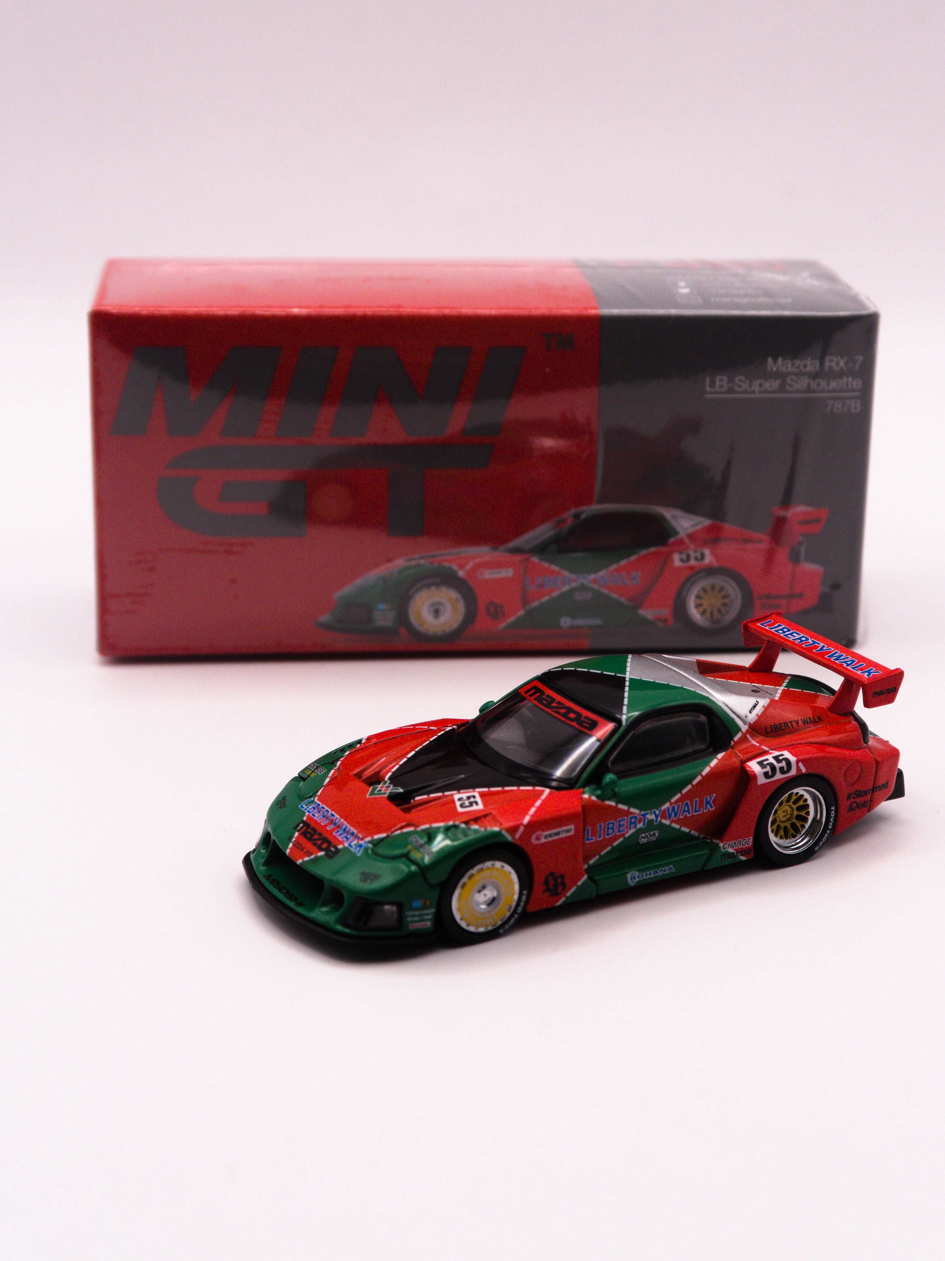 Mini GT #990 Mazda RX-7 LB-Super Silhouette 787B Zielono-Czerwony