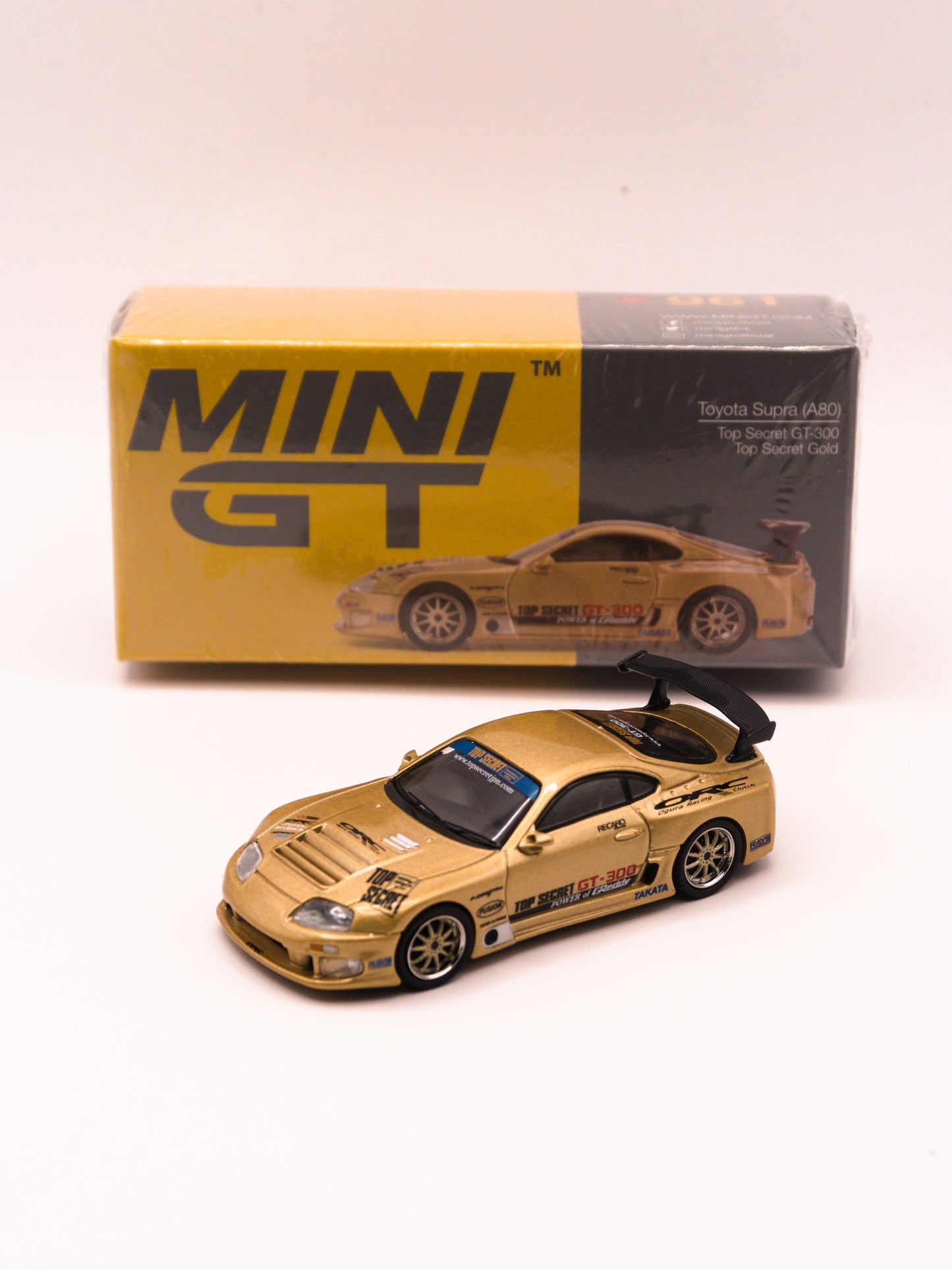 Mini GT #961 Toyota Supra A80 Top Secret GT-300 Złoty