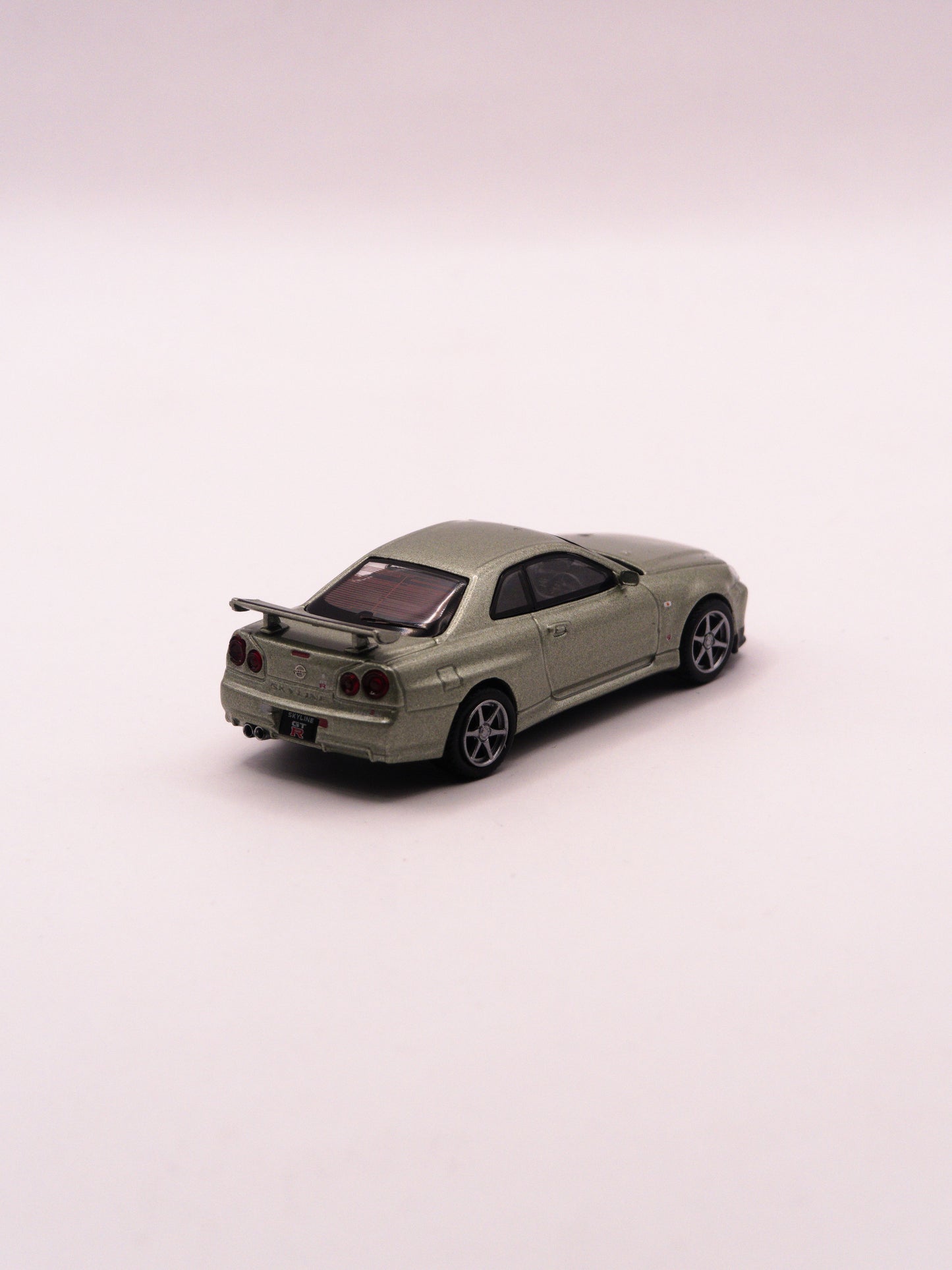 Mini GT #1003 Nissan Skyline GT-R R34 V-Spec II Nur Zielony