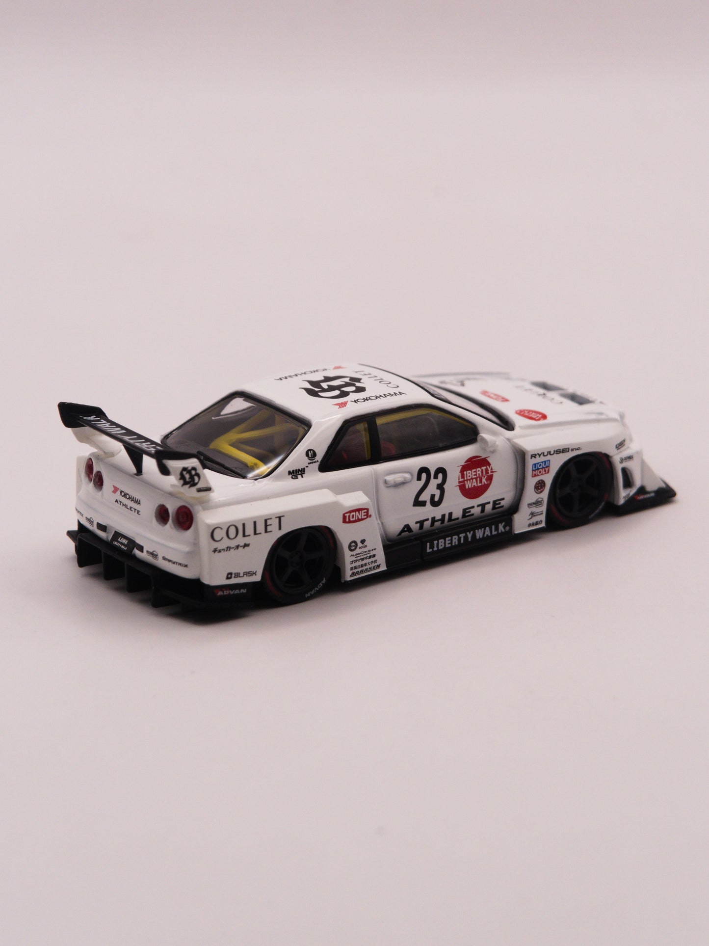 Mini GT #1059 Nissan Skyline GT-R R34 Liberty Walk Super Silhouette Athlete Biały *BLISTER