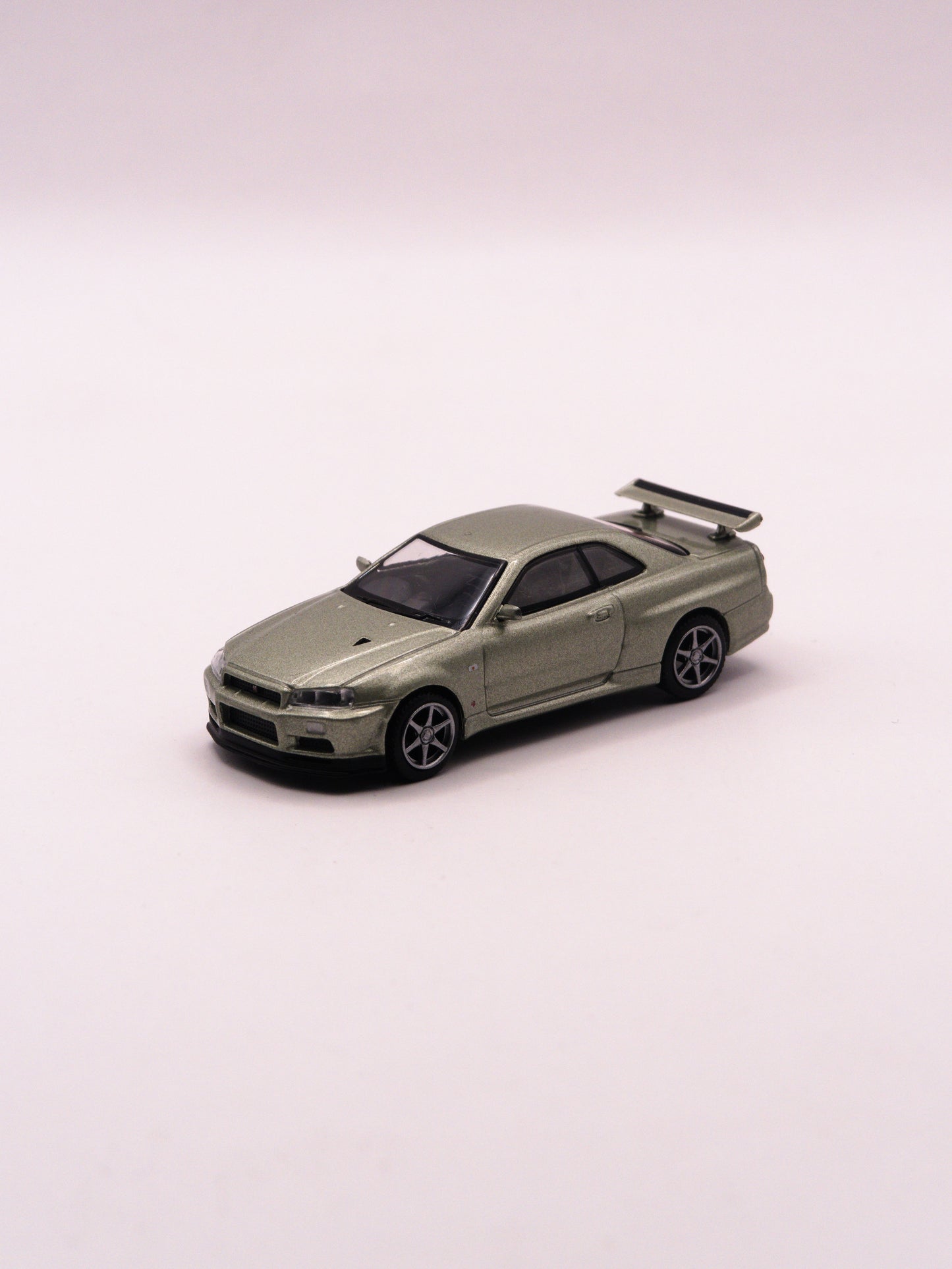 Mini GT #1003 Nissan Skyline GT-R R34 V-Spec II Nur Zielony