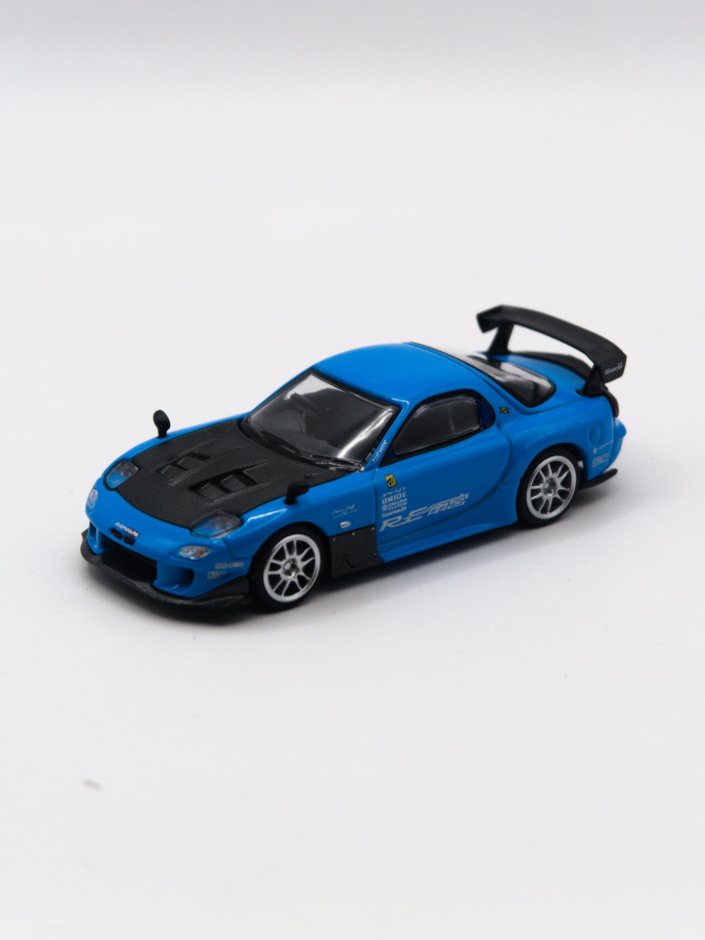 Mini GT #1046 Mazda RX-7 RE-Amemiya 20B NA 3ROTOR-7 Ama-San Go Niebieski