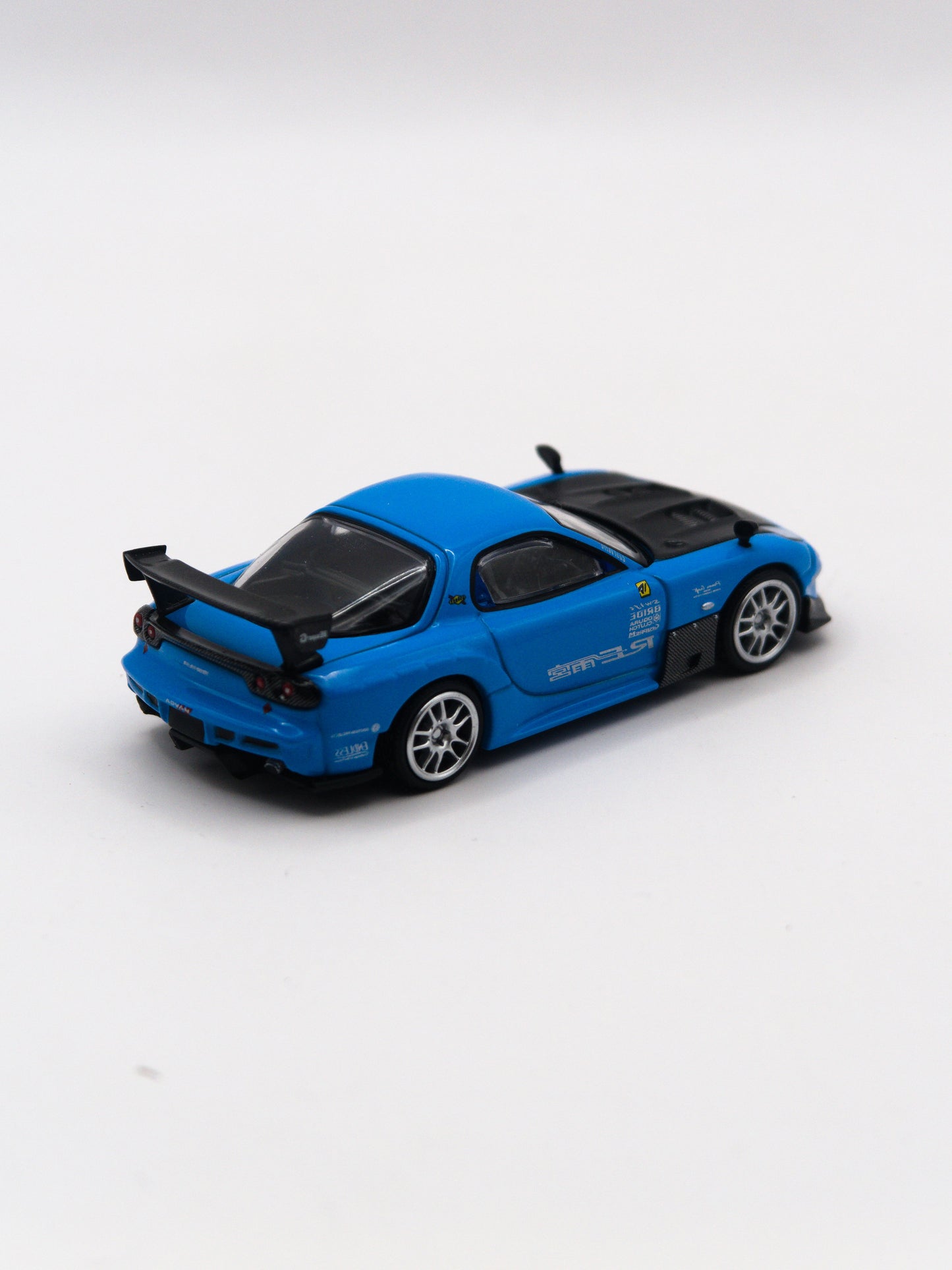 Mini GT #1046 Mazda RX-7 RE-Amemiya 20B NA 3ROTOR-7 Ama-San Go Niebieski