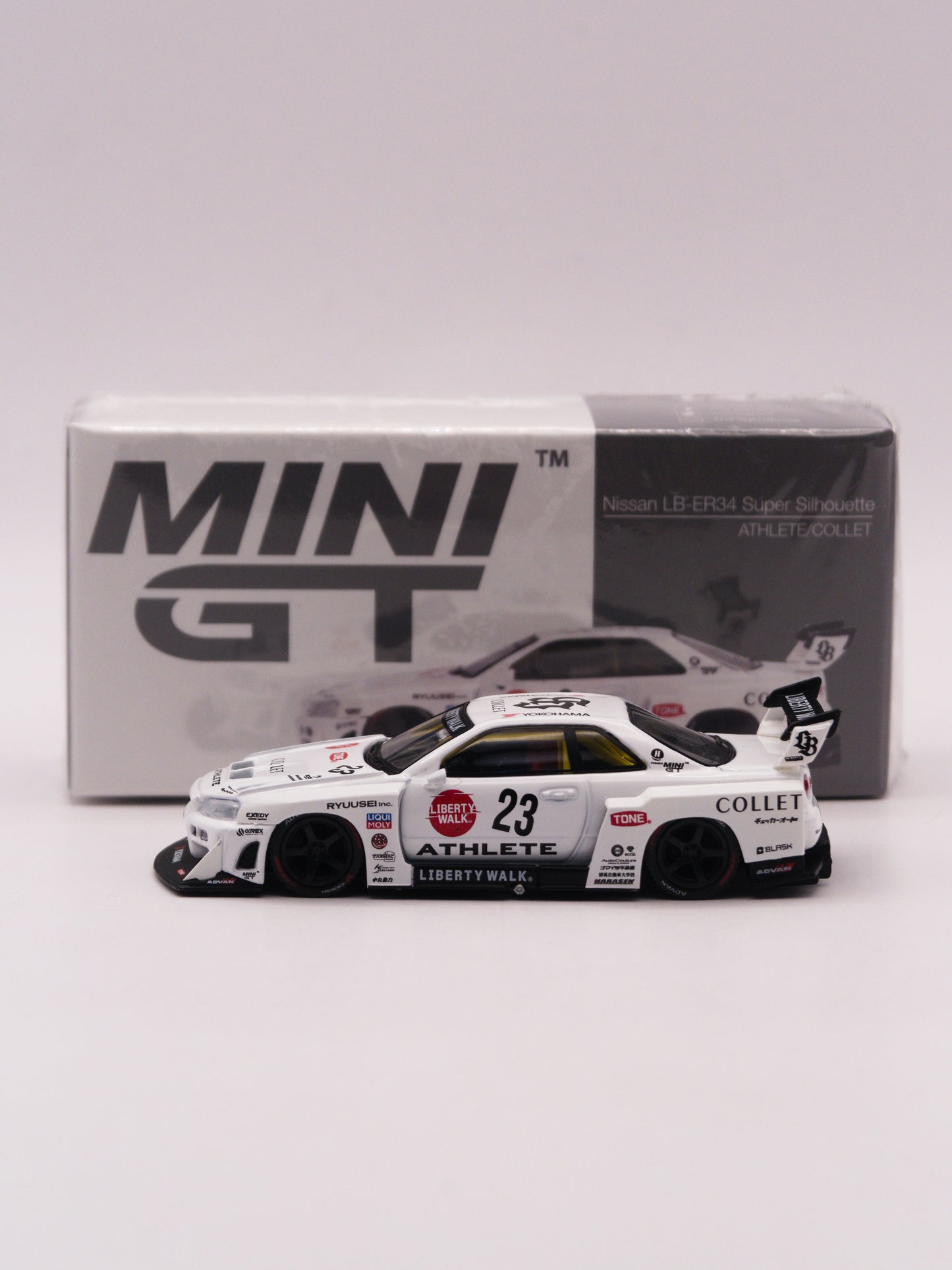 Mini GT #1059 Nissan Skyline GT-R R34 Liberty Walk Super Silhouette Athlete Biały