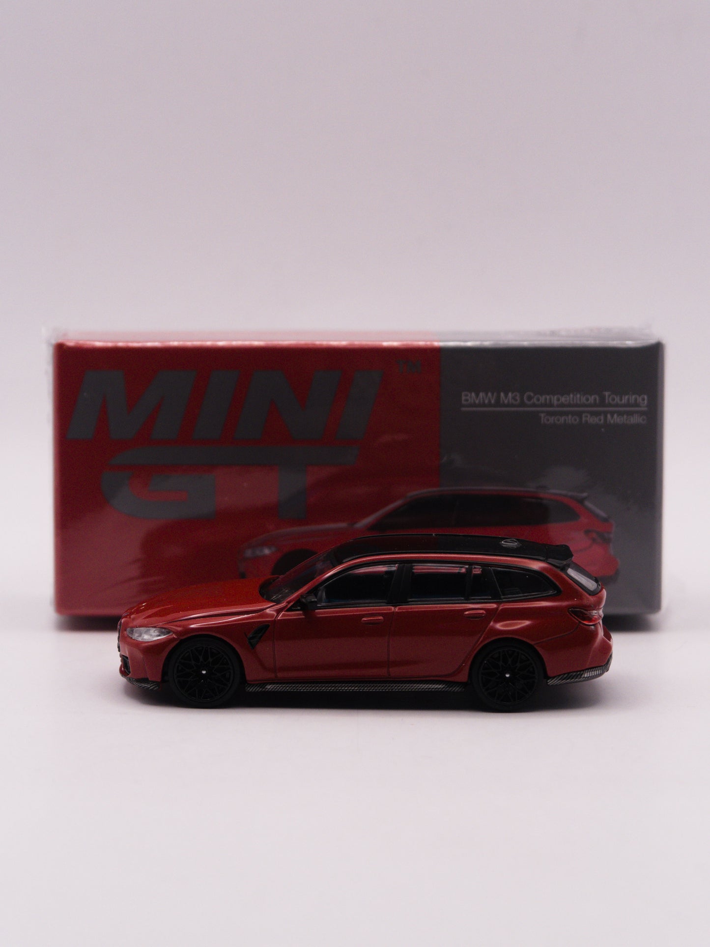 Mini GT #700 BMW M3 Touring Competition Czerwony
