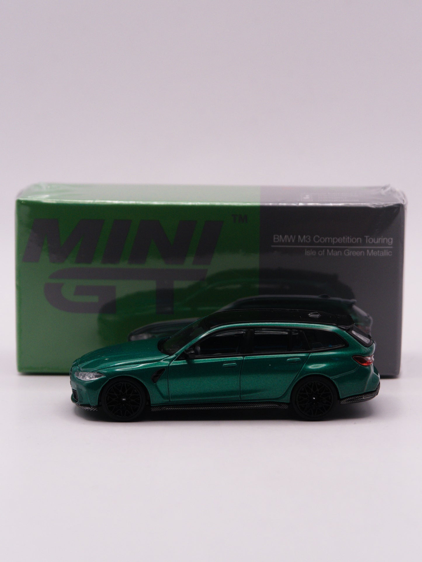 Mini GT #764 BMW M3 Touring Competition Zielony