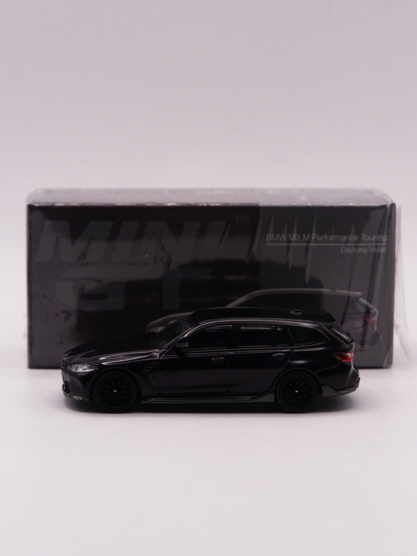 Mini GT #896 BMW M3 Touring Competition Fioletowy